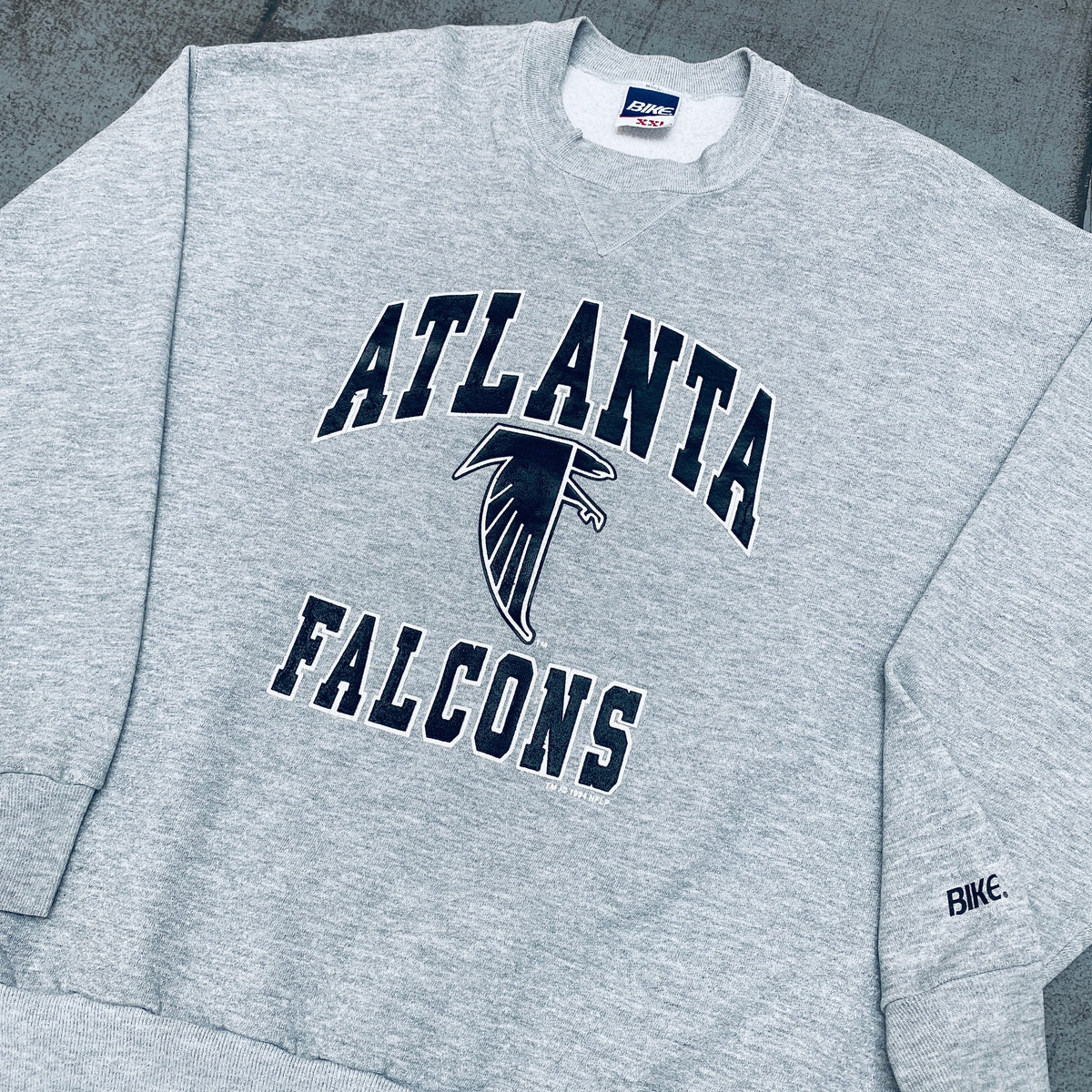 Atlanta Falcons: 1994 Graphic Spellout Sweat (XL/XXL) – National