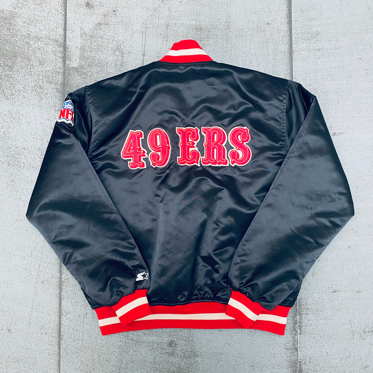 San Francisco 49ers: 1980's White Satin Reverse Spellout Proline