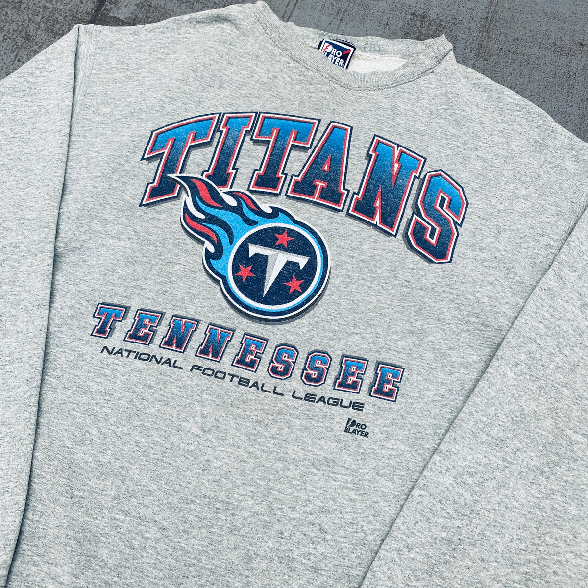 Tennessee Titans: 1999 Pro Player Graphic Spellout Sweat (L