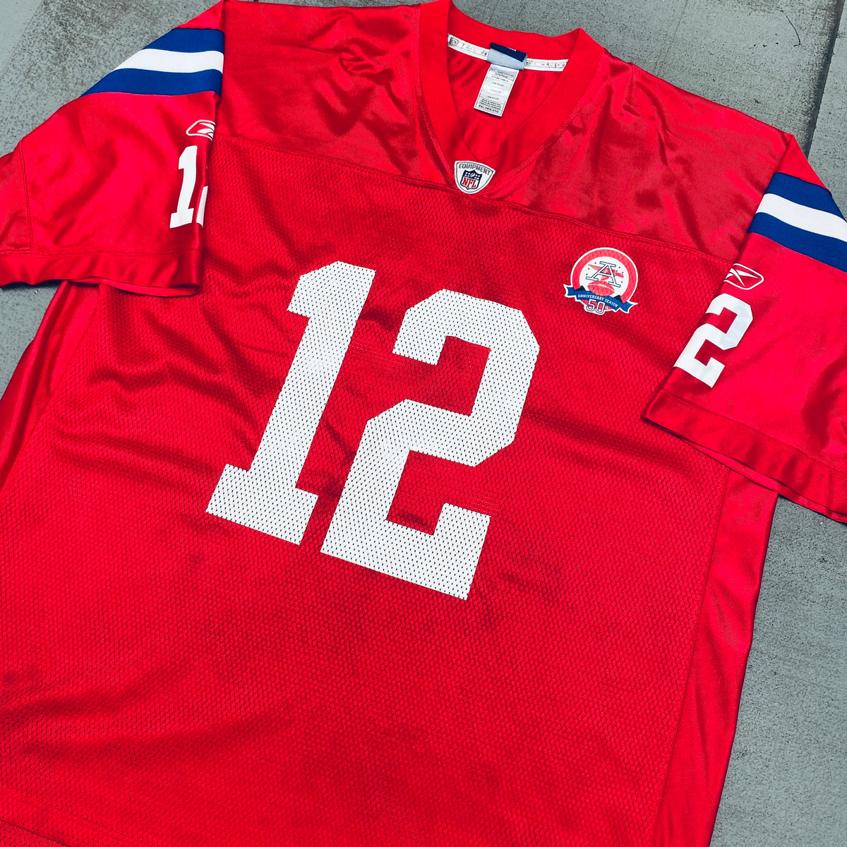 I know it's a long shot but does anyone know where I can find a 2009 AFL  50th Anniversary AWAY Jersey? Preferably Tom Brady. My all-time favorite  Pats jersey. Love the red