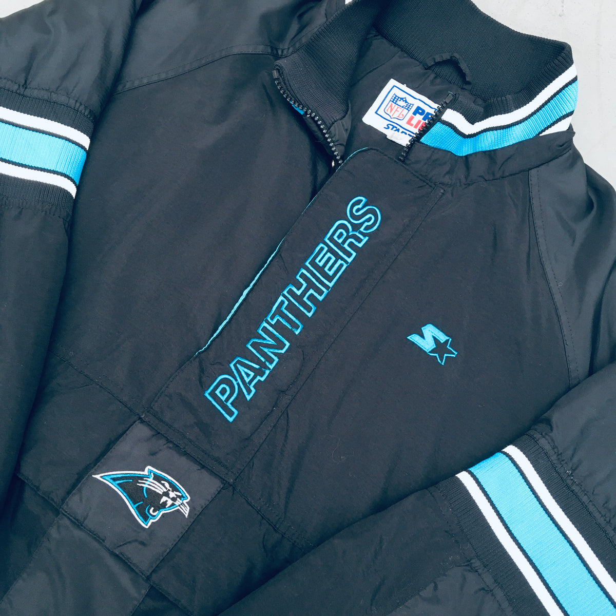 Carolina Panthers: 1994 Logo 7 Team Announce 1/4 Zip Breakaway Jacket –  National Vintage League Ltd.