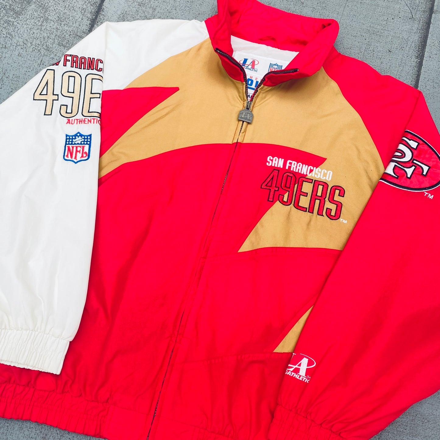 San Francisco 49ers: 1990's Logo Athletic Shark Tooth Proline Fullzip Lightweight Jacket (L/XL)