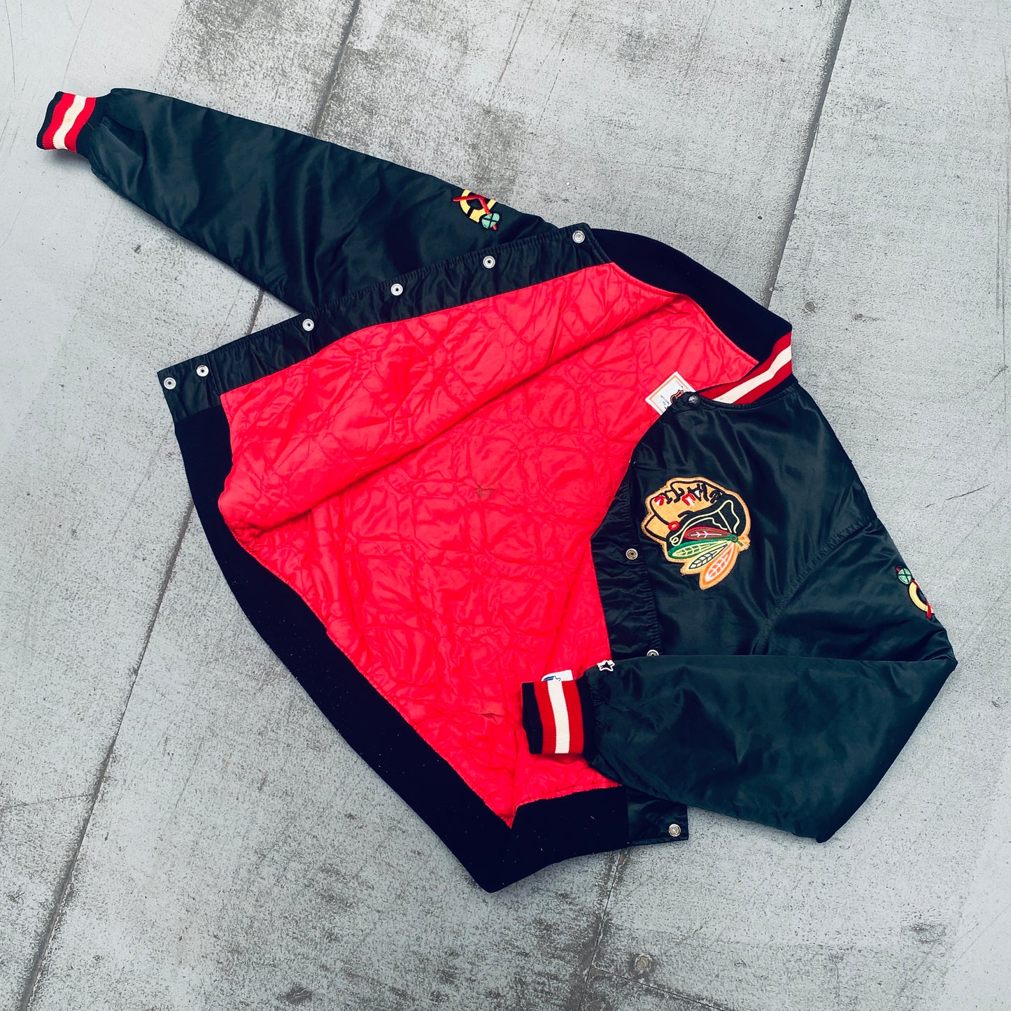 Chicago Blackhawks: 1980's Blackout Satin Starter Bomber Jacket (L)