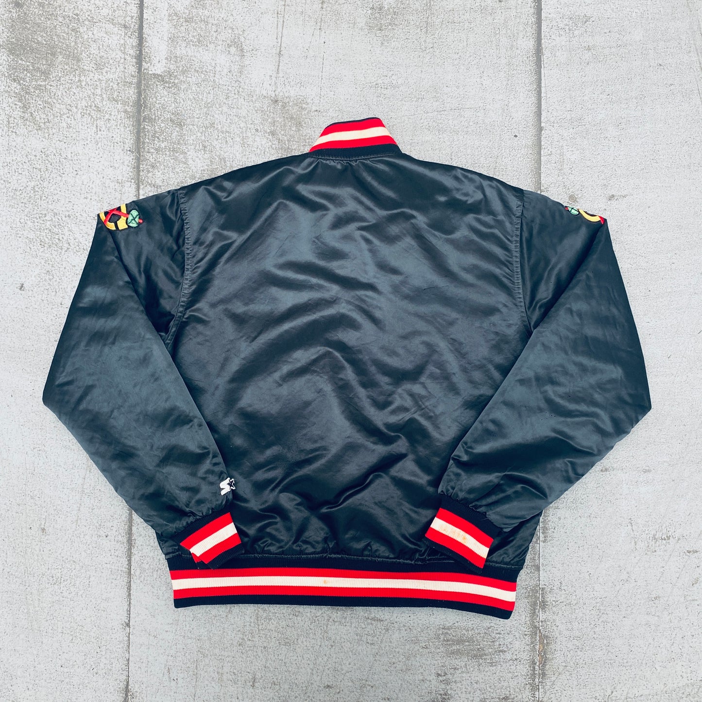 Chicago Blackhawks: 1980's Blackout Satin Starter Bomber Jacket (L)