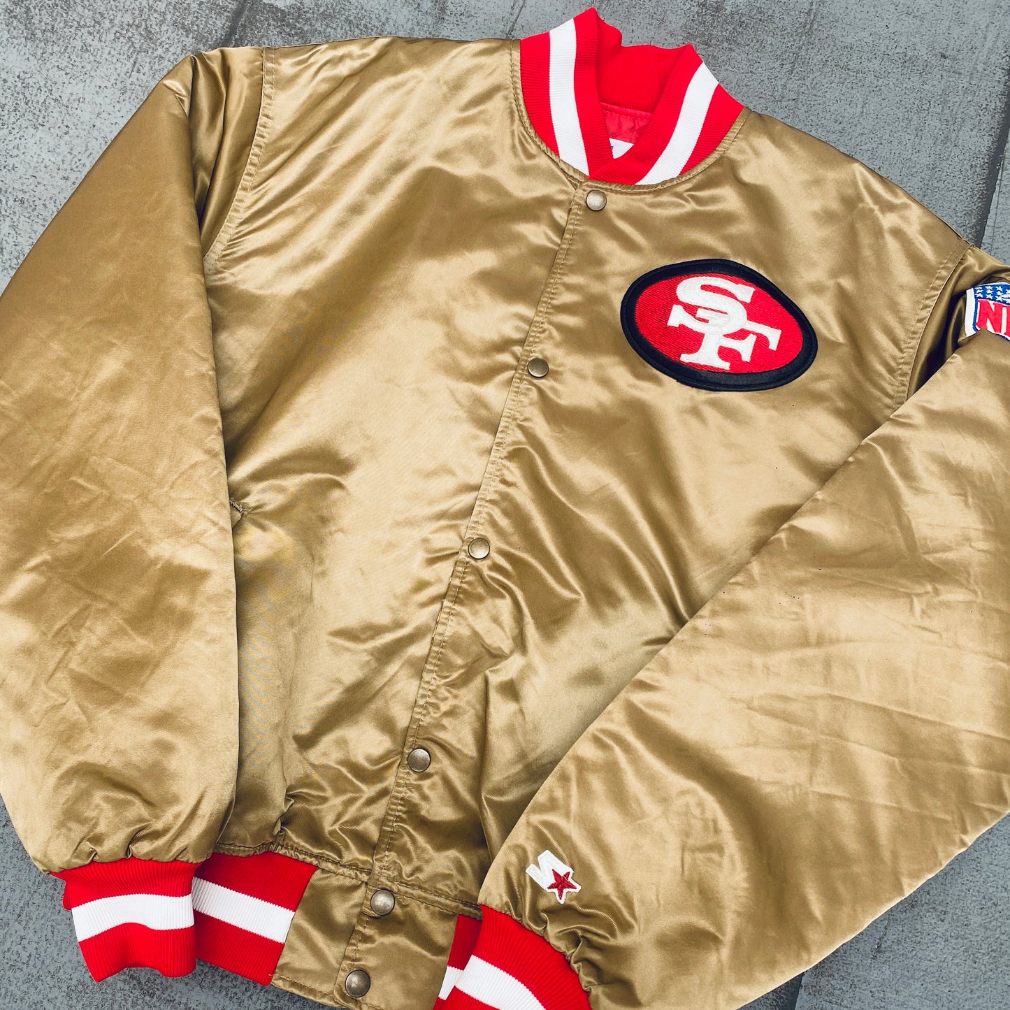 San Francisco 49ers: 1980's Satin Reverse Spellout Proline Starter Bomber Jacket (XL)