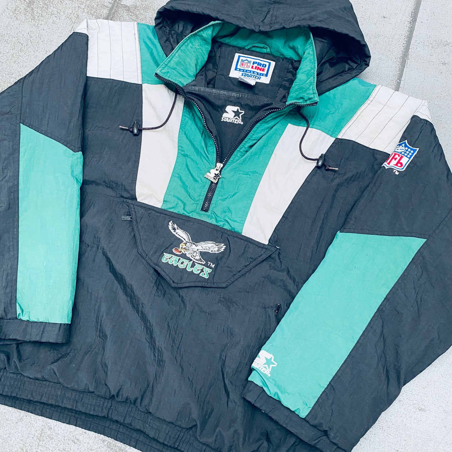 Philadelphia Eagles: 1990's Blackout 1/4 Zip Proline Starter Breakaway Jacket (XL)