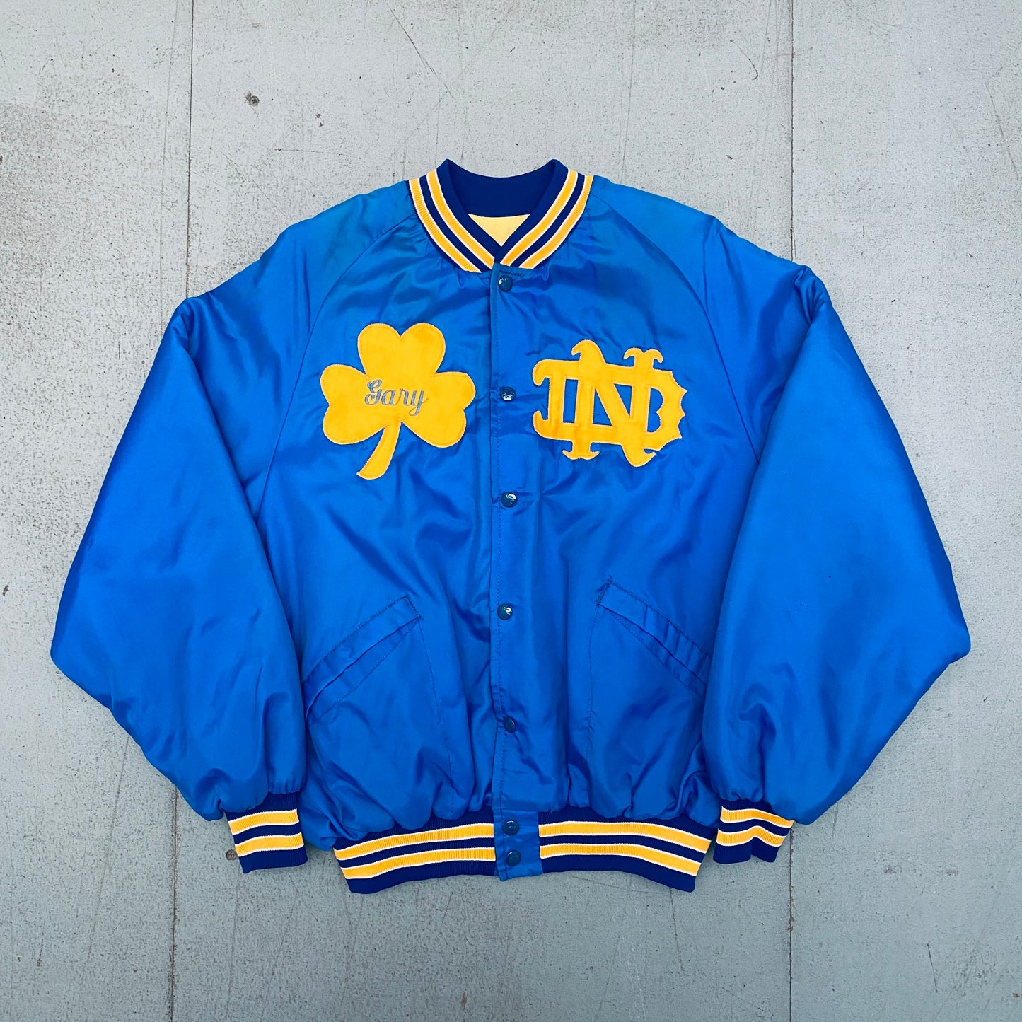 Notre Dame Fighting Irish: 1980's Reverse Stitched Spellout Satin Bomber Jacket (L/XL)