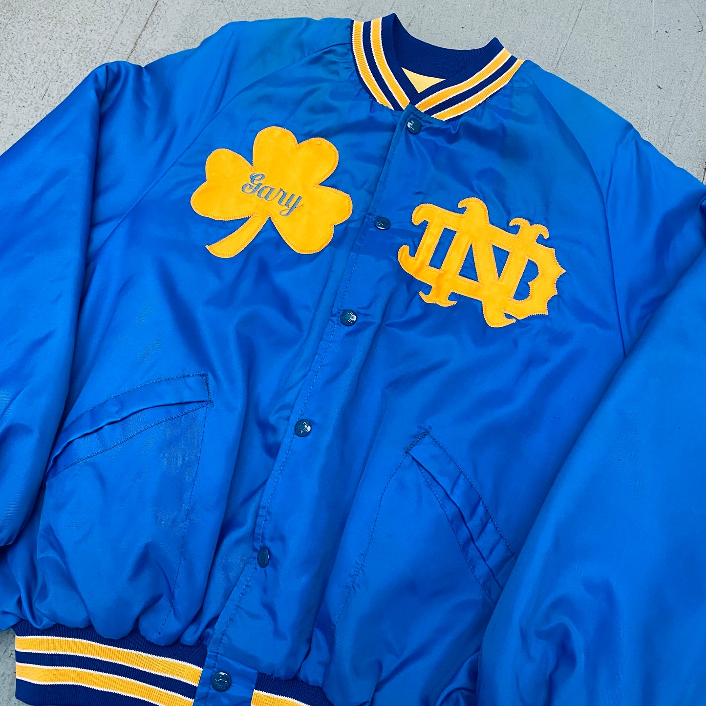 Notre Dame Fighting Irish: 1980's Reverse Stitched Spellout Satin Bomber Jacket (L/XL)