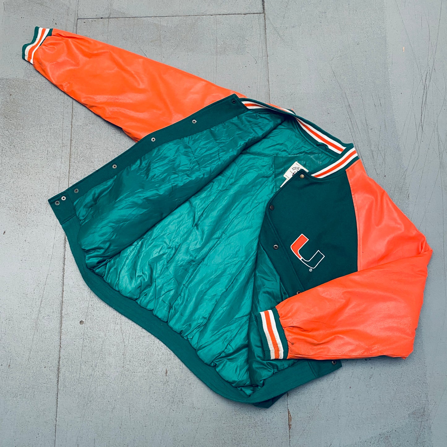 Miami Hurricanes: 2000's Reverse Spellout Varsity Jacket (XXL)