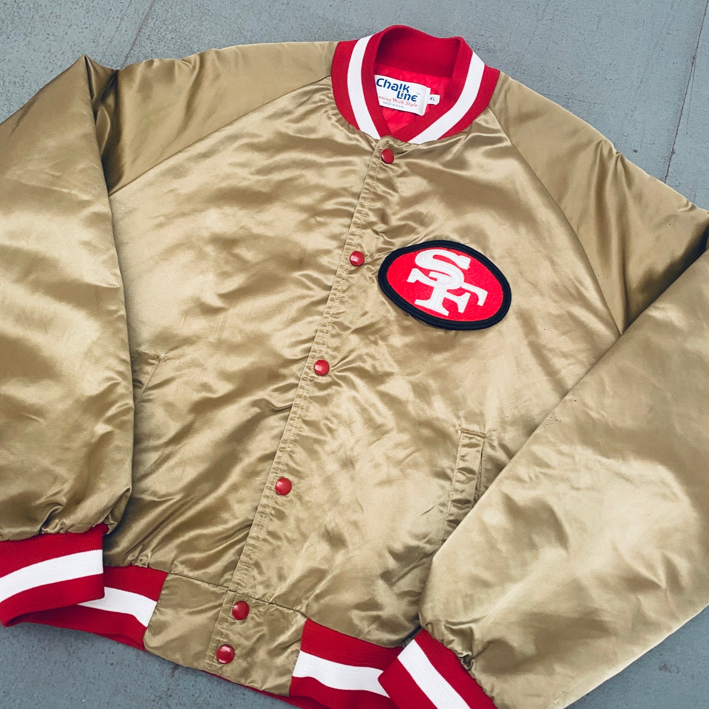 San Francisco 49ers: 1980's Chalk Line Satin Reverse Stitched Spellout Bomber Jacket (XL)