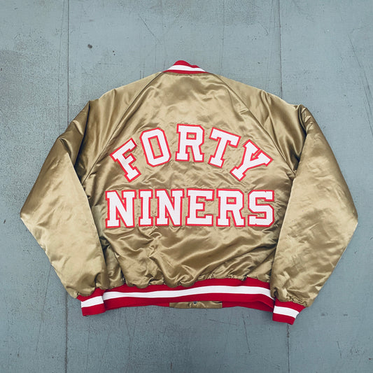 San Francisco 49ers: 1980's Chalk Line Satin Reverse Stitched Spellout Bomber Jacket (XL)