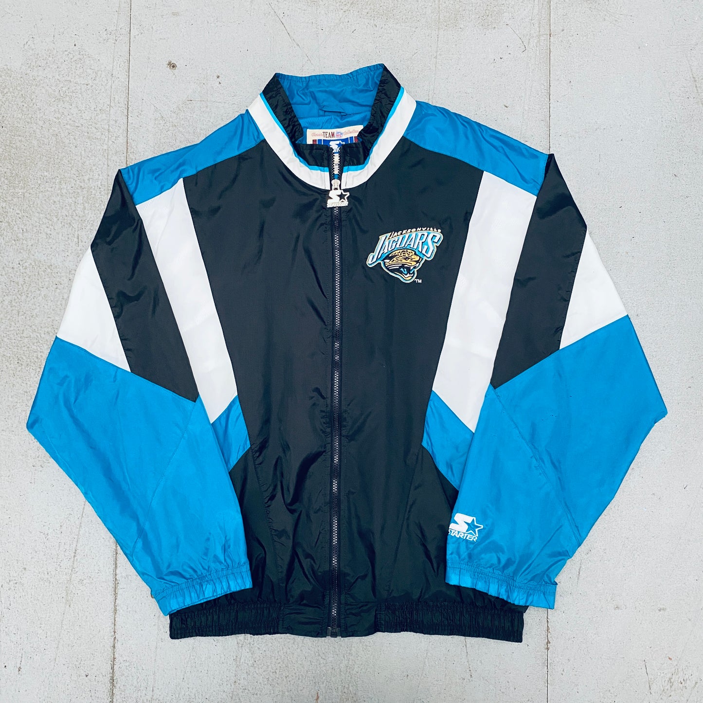 Jacksonville Jaguars: 1990's Fullzip Starter Windbreaker (XL)