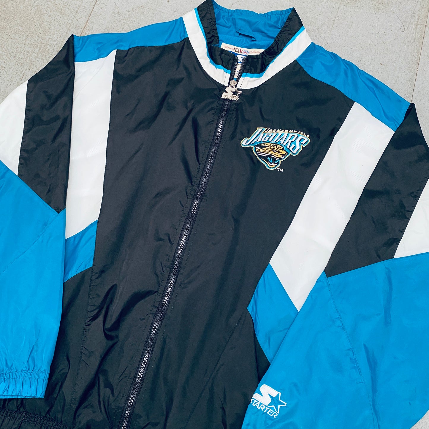 Jacksonville Jaguars: 1990's Fullzip Starter Windbreaker (XL)