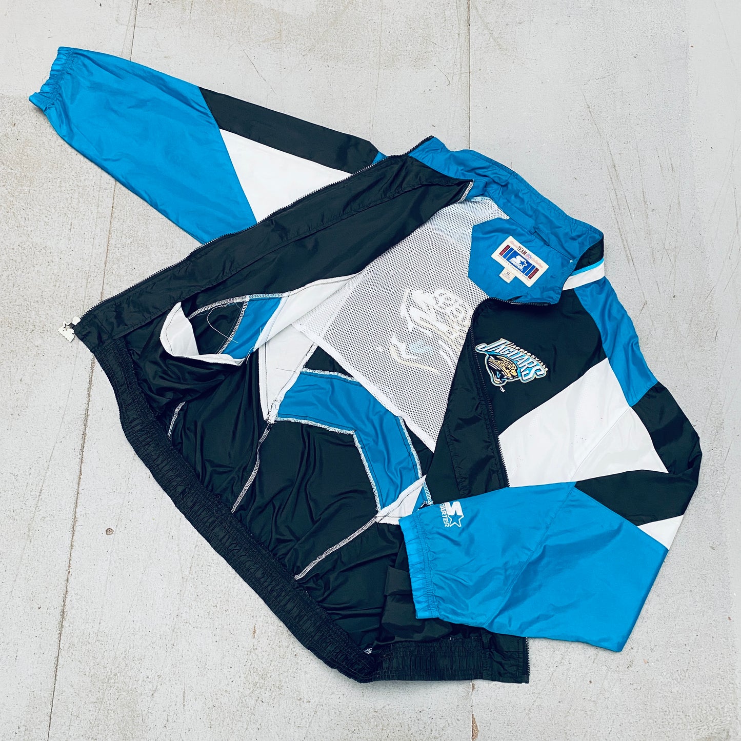 Jacksonville Jaguars: 1990's Fullzip Starter Windbreaker (XL)