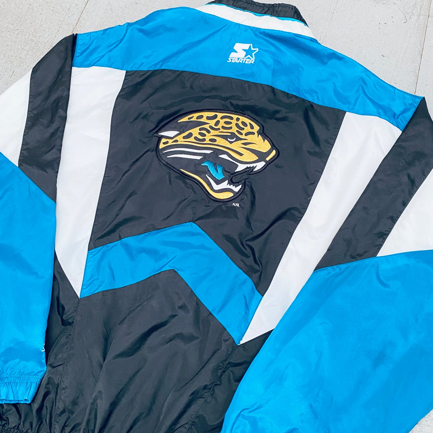 Jacksonville Jaguars: 1990's Fullzip Starter Windbreaker (XL)