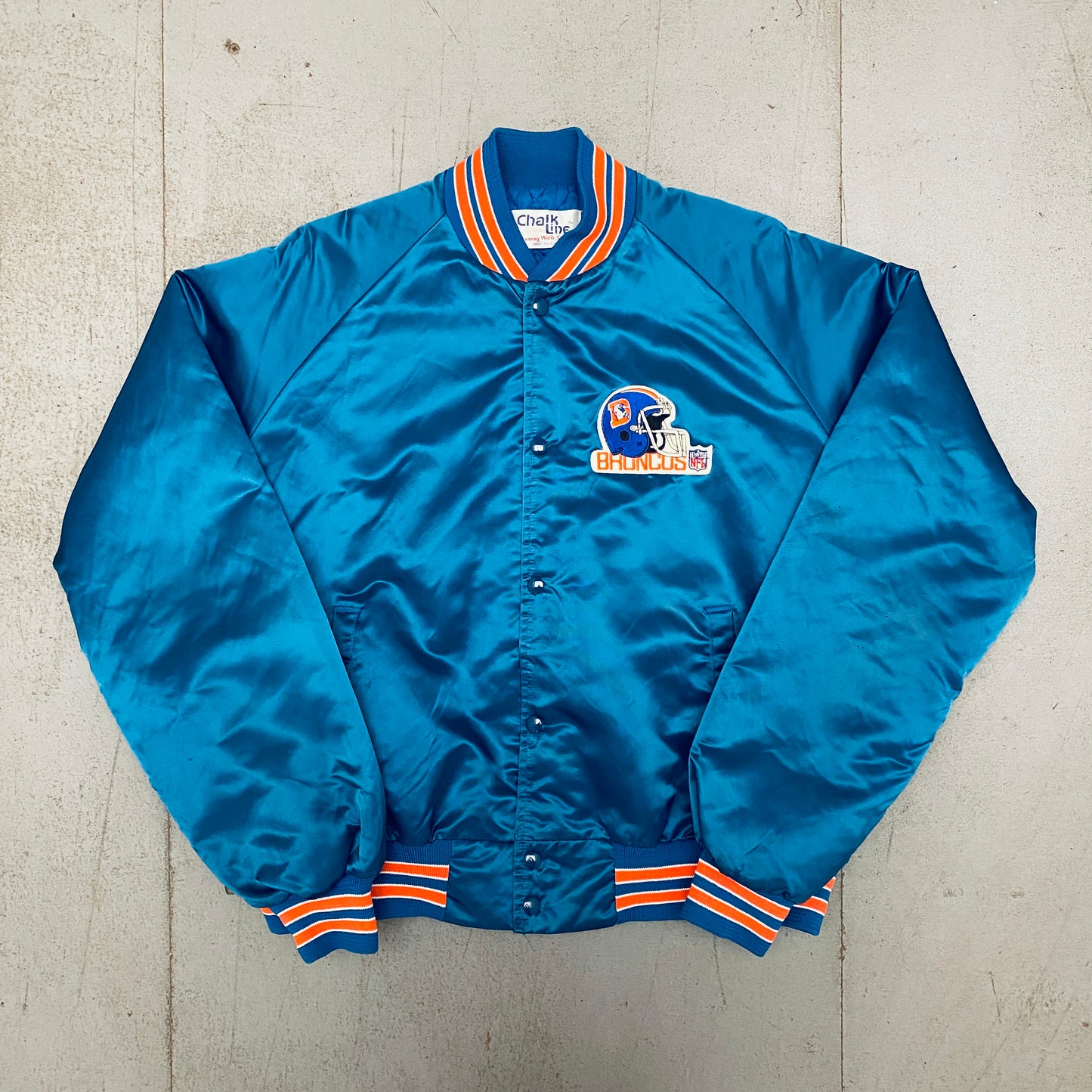 Denver Broncos: 1980's Chalk Line Satin Bomber Jacket (XL)