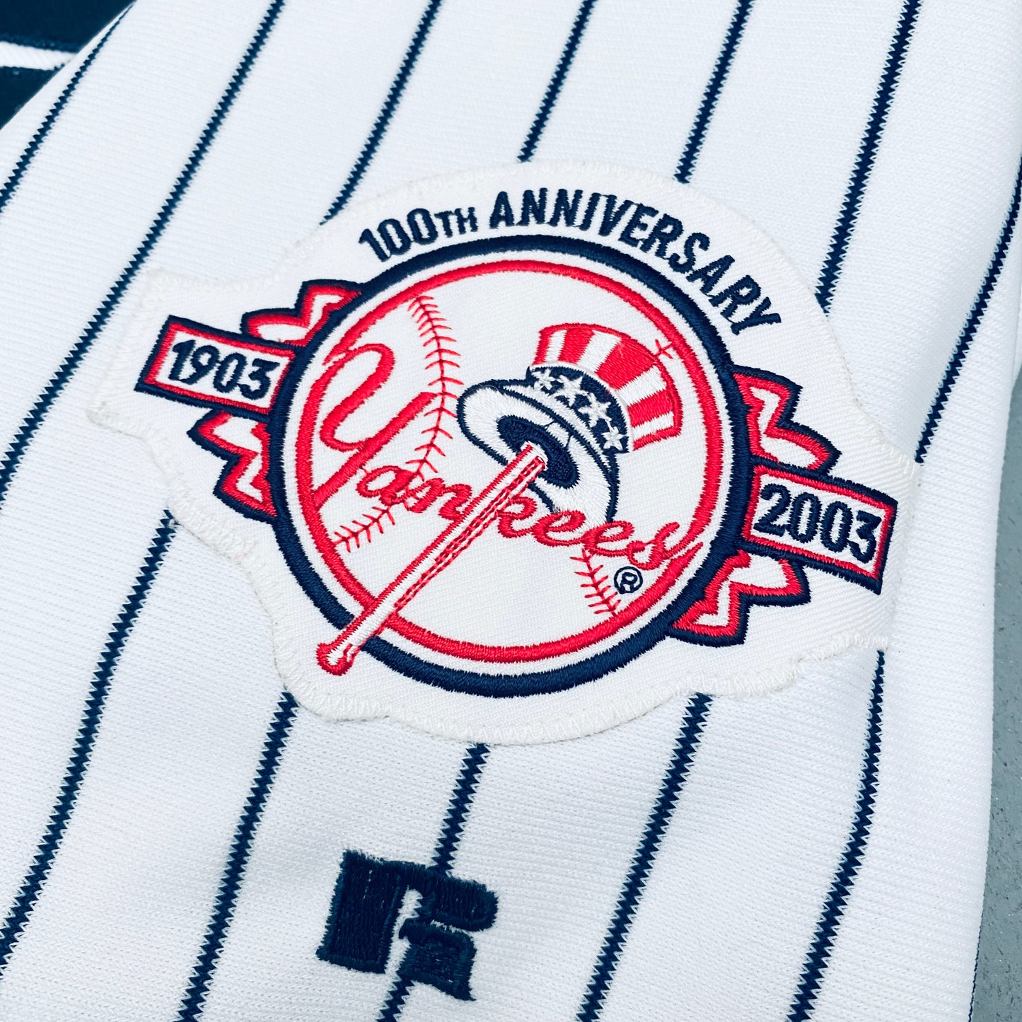 New York Yankees: Jason Giambi 2003 White Pinstripe Russell Athletic Stitched Jersey w/ 100th Anniversary Patch (L/XL)