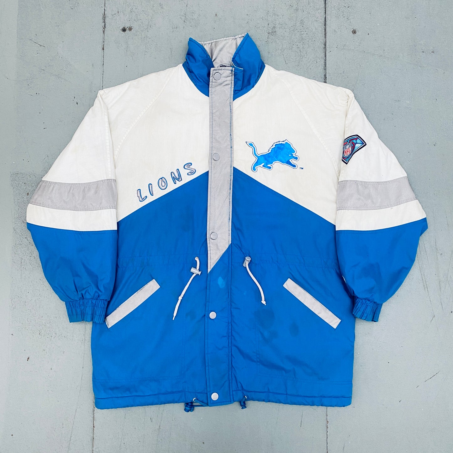 Detroit Lions: 1994 Pro Player HUGE Graffiti Spellout Fullzip Trench Coat w/ 75th Anniversary Patch (L)