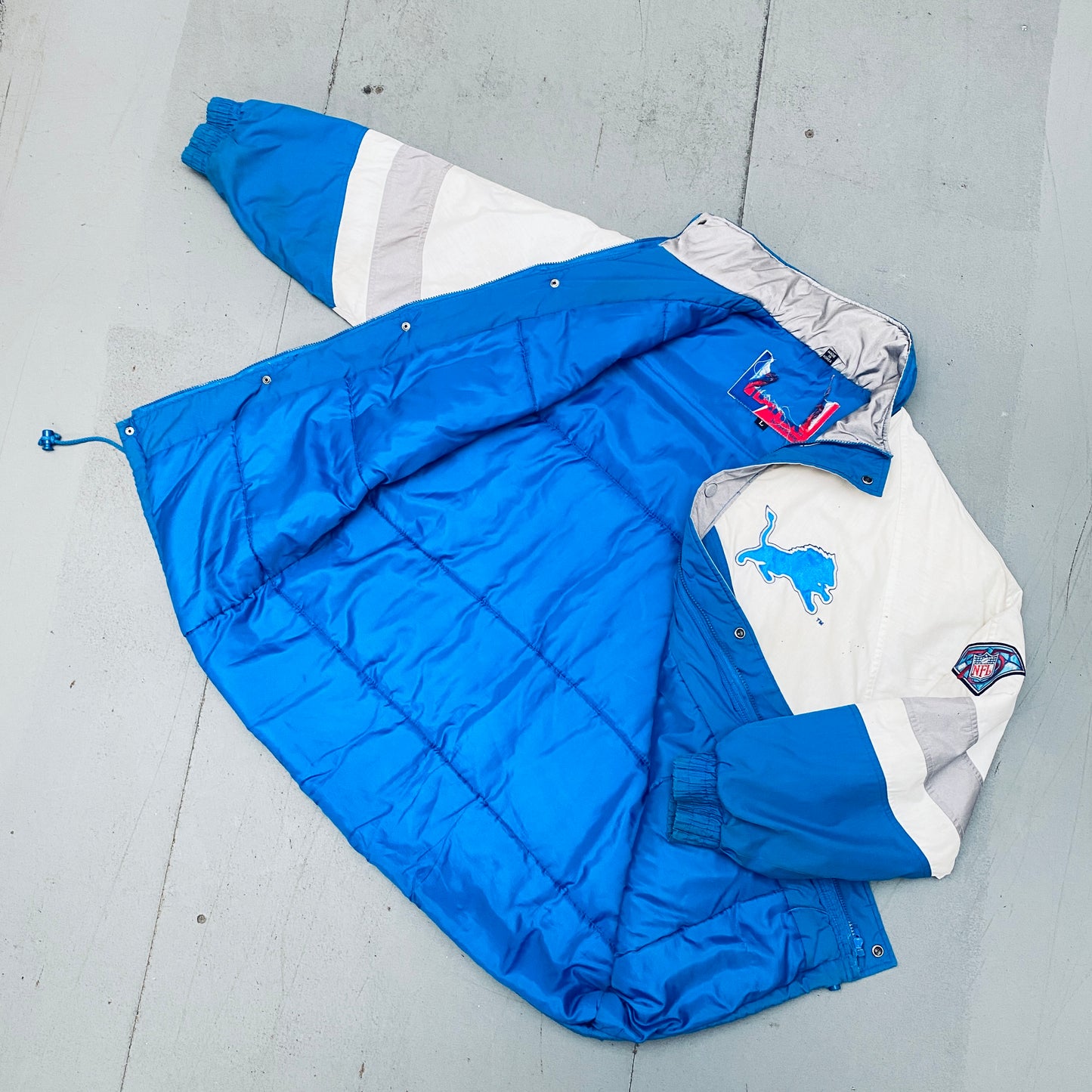 Detroit Lions: 1994 Pro Player HUGE Graffiti Spellout Fullzip Trench Coat w/ 75th Anniversary Patch (L)