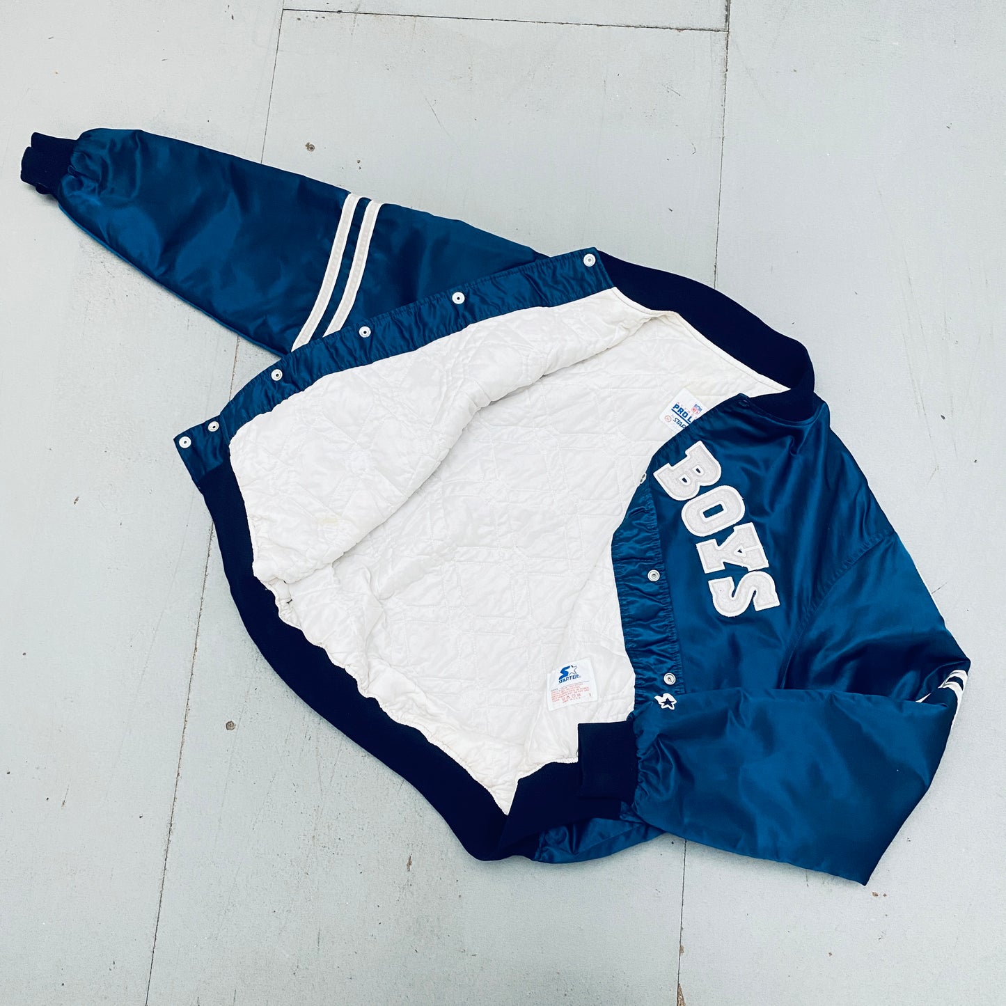 Dallas Cowboys: 1980's Satin Stitched Spellout Proline Starter Bomber Jacket (XL/XXL)