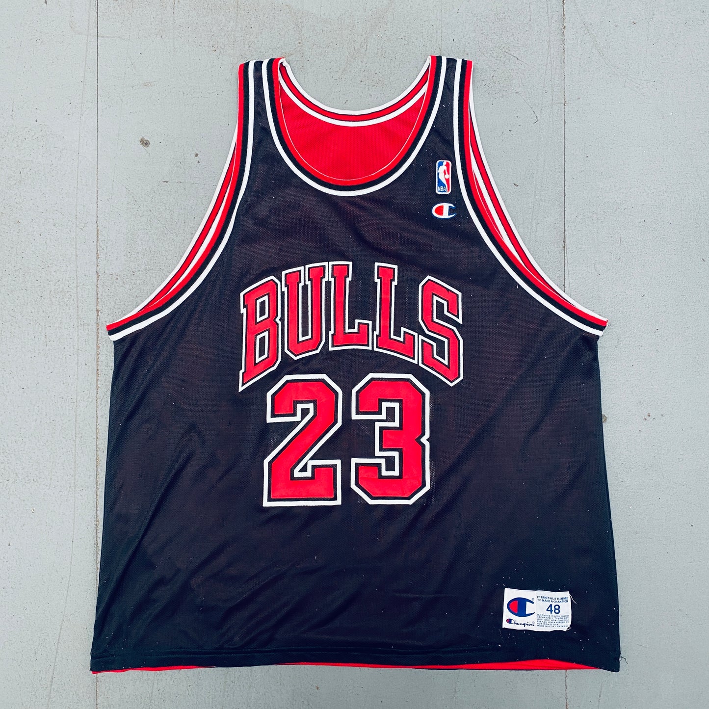 Chicago Bulls: Michael Jordan 1997/98 Red & Black Champion Reversible Jersey (L/XL)