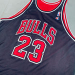Chicago Bulls: Michael Jordan 1997/98 Red & Black Champion Reversible Jersey (L/XL)
