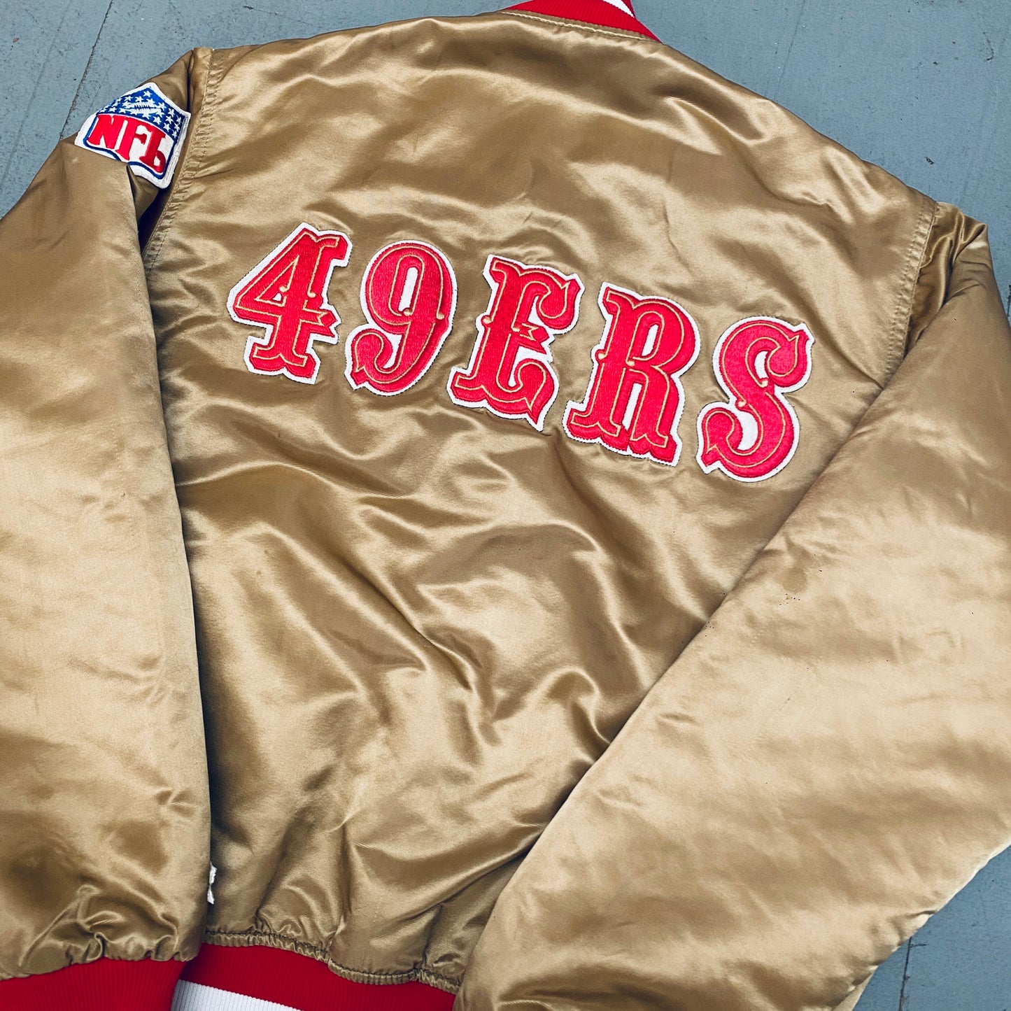 San Francisco 49ers: 1980's Satin Stitched Reverse Spellout Proline Starter Bomber Jacket (M)