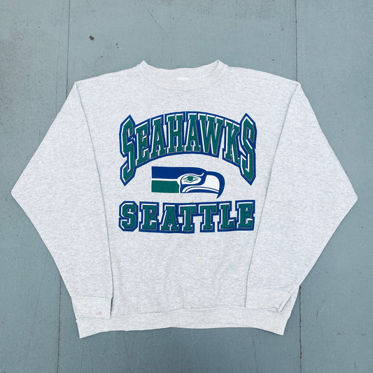 Seattle Seahawks: 1990's Logo 7 Graphic Spellout Sweat (L)