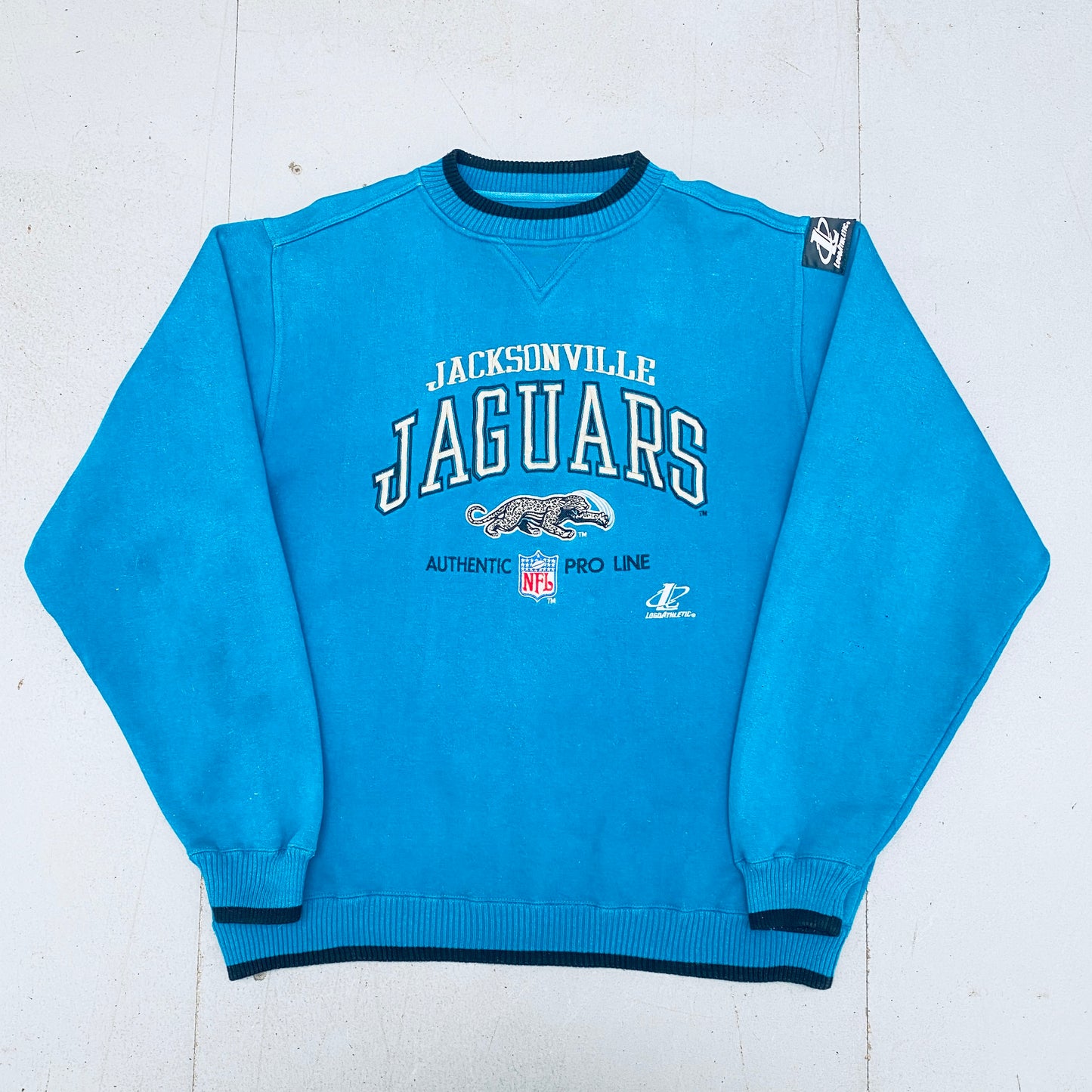 Jacksonville Jaguars: 1990's Logo Athletic Embroidered Spellout Proline Sweat (L)