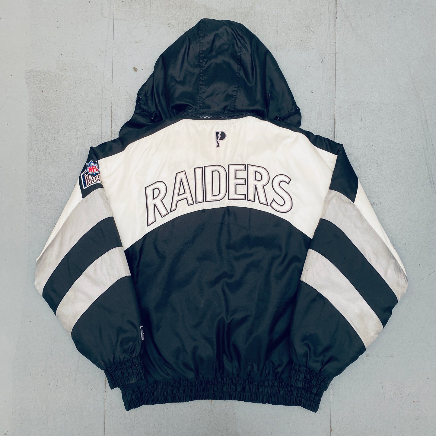 Oakland Raiders: 1990's Pro Player Reverse Spellout Fullzip Jacket (XL)