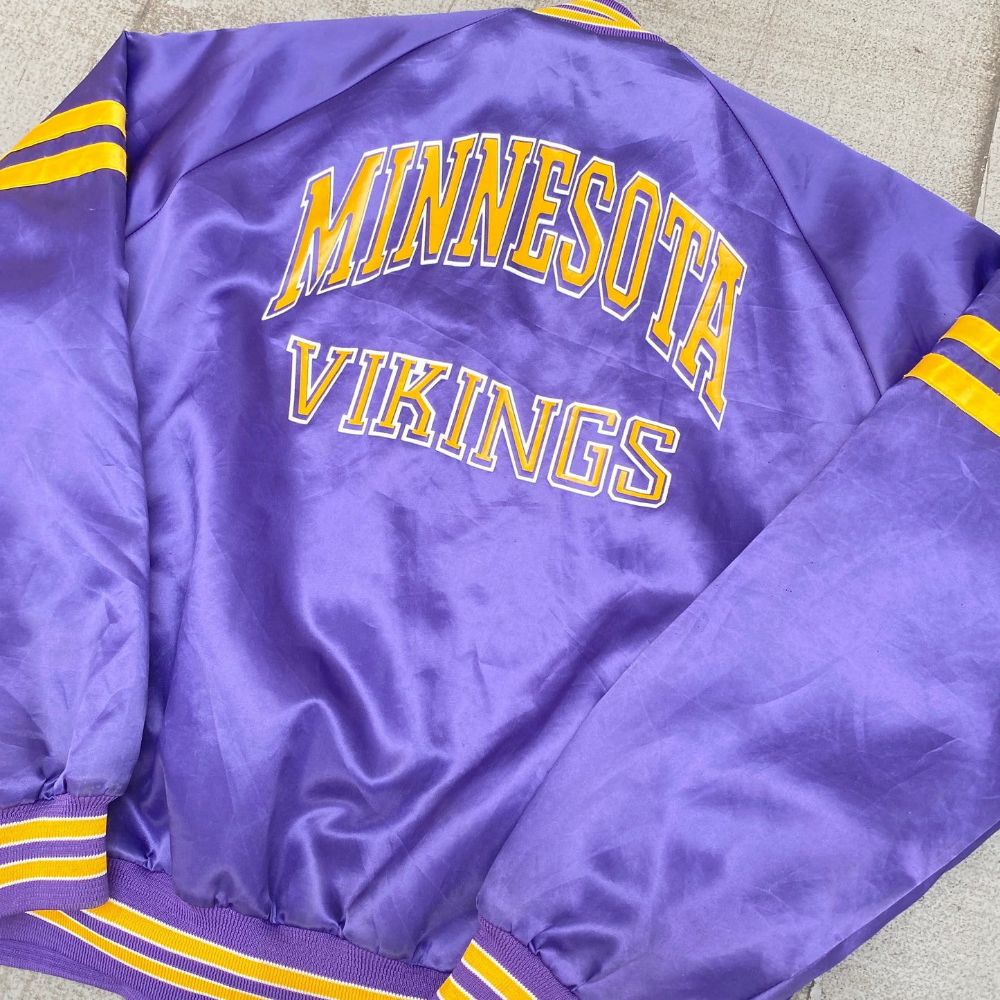 Minnesota Vikings: 1980's Chalk Line Satin Reverse Spellout Bomber Jacket (L)