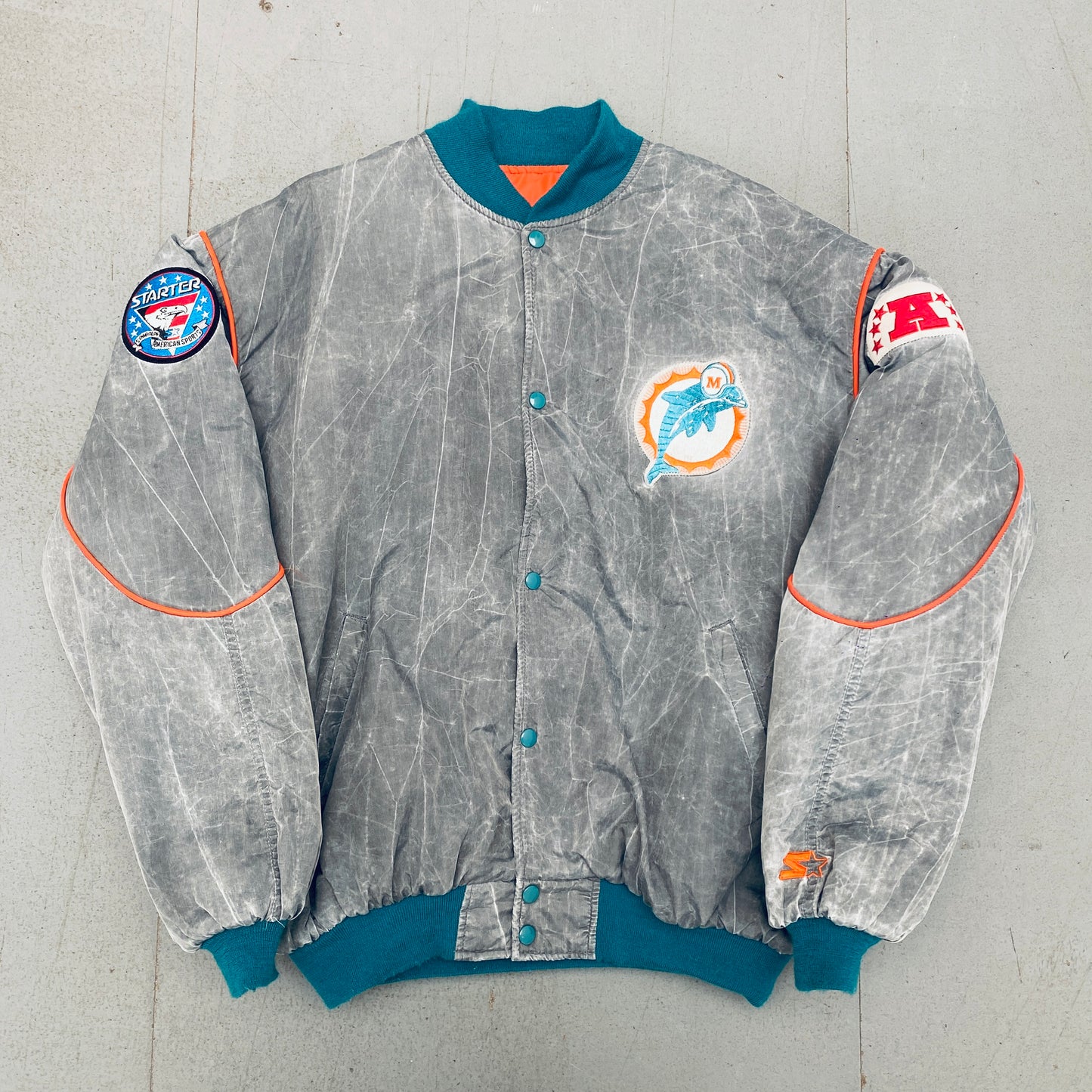 Miami Dolphins: 1990's Reverse Spellout Stone Wash Starter Bomber Jacket w/ NASA Patch (XL)