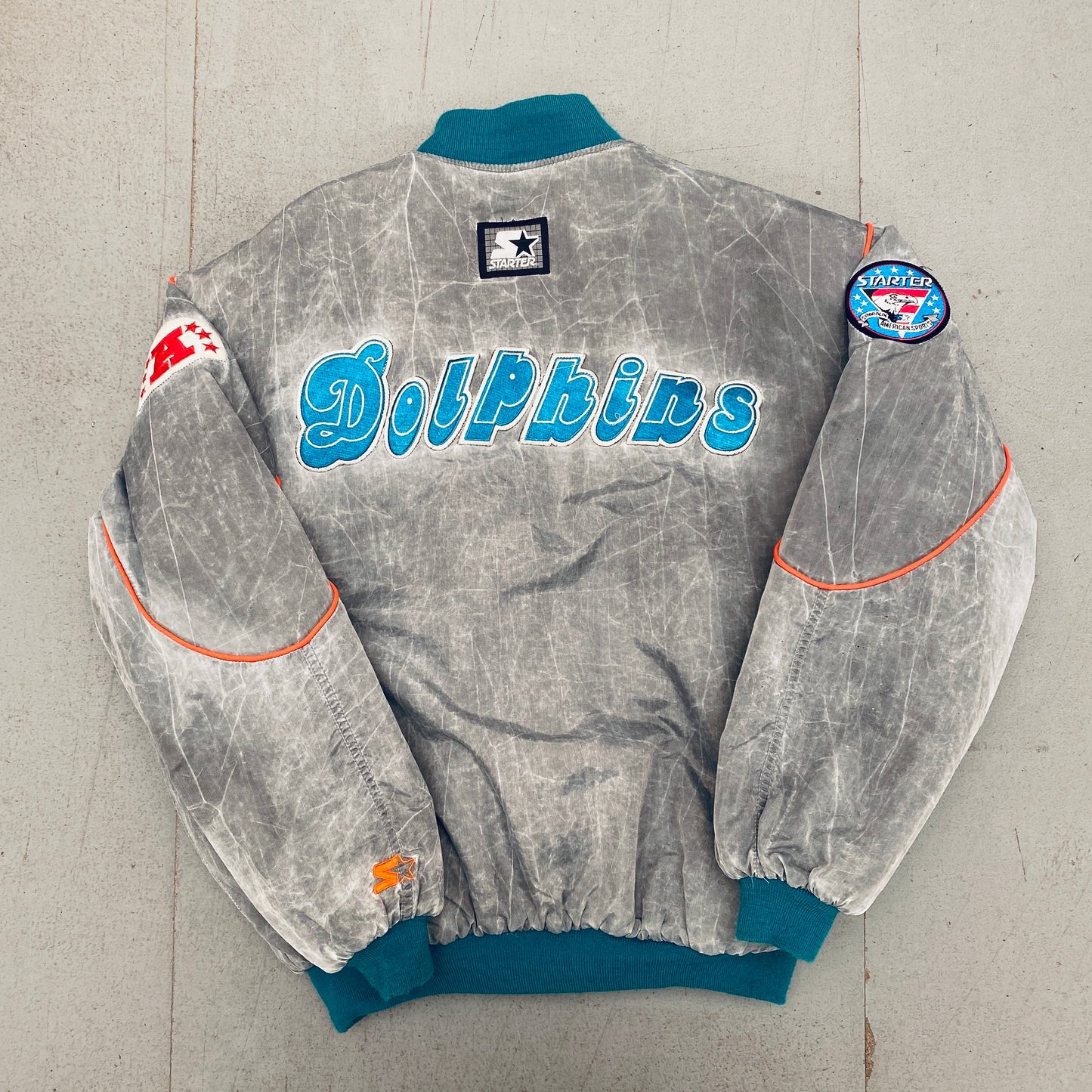 Miami Dolphins: 1990's Reverse Spellout Stone Wash Starter Bomber Jacket w/ NASA Patch (XL)