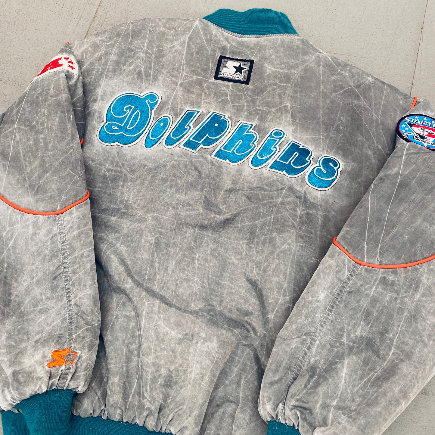 Miami Dolphins: 1990's Reverse Spellout Stone Wash Starter Bomber Jacket w/ NASA Patch (XL)