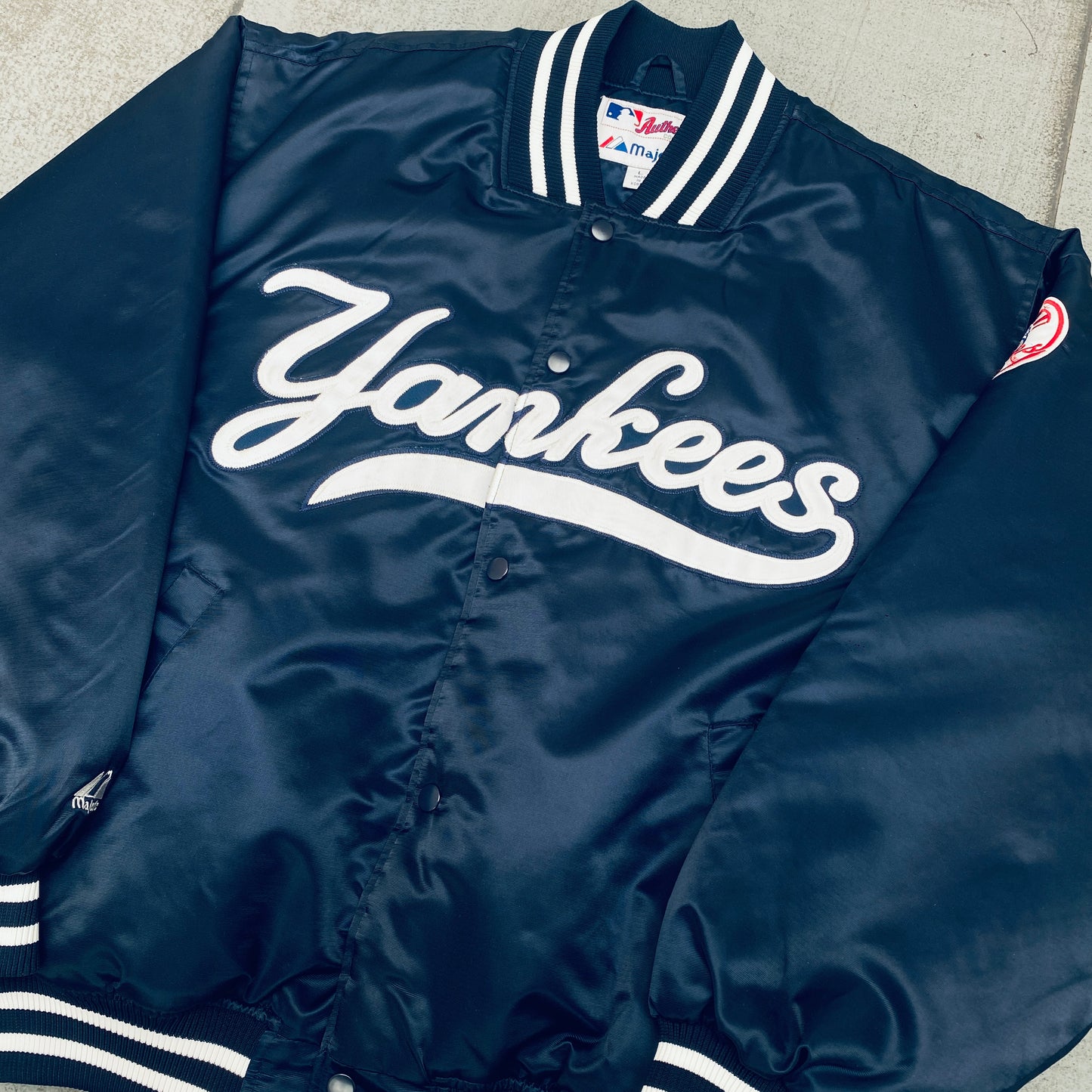 New York Yankees: 2000's Majestic Satin Stitched Spellout Bomber Jacket (XL)