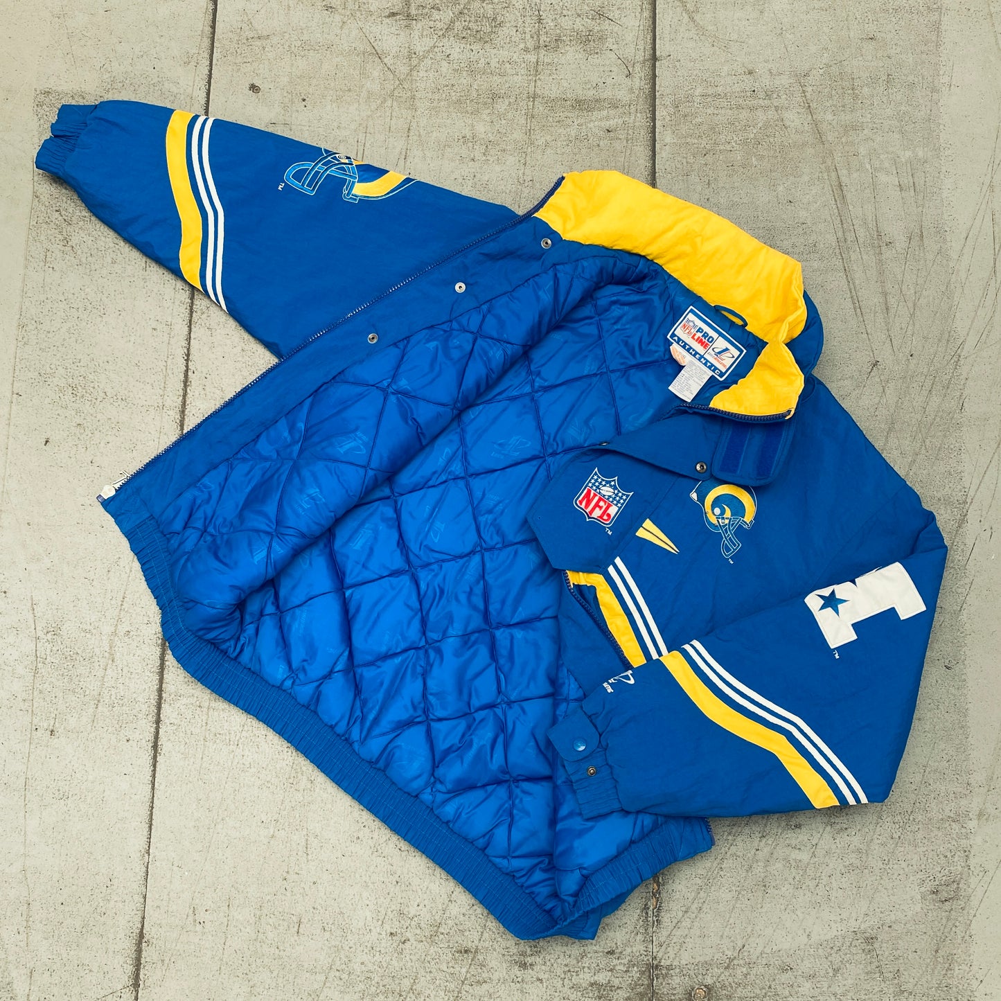 St. Louis Rams: 1990's Logo Athletic Diamond Spike Fullzip Proline Jacket (M/L)