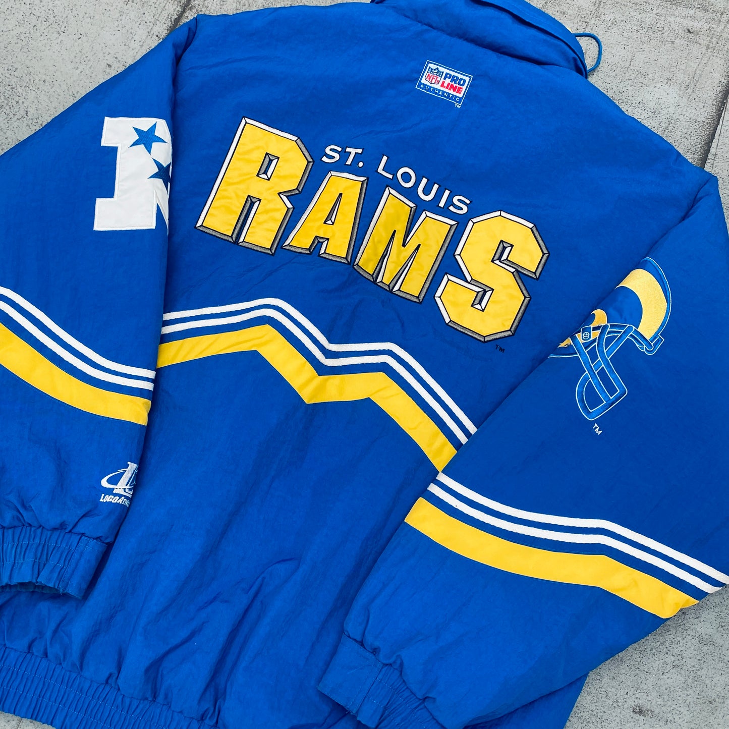 St. Louis Rams: 1990's Logo Athletic Diamond Spike Fullzip Proline Jacket (M/L)