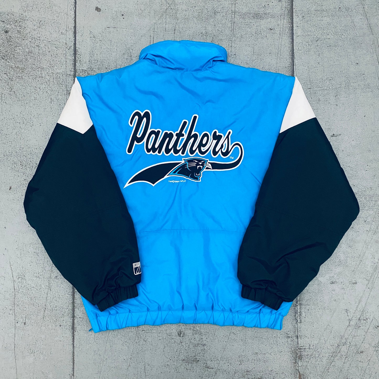 Carolina Panthers: 1994 Logo 7 Team Announce 1/4 Zip Breakaway Jacket (M)