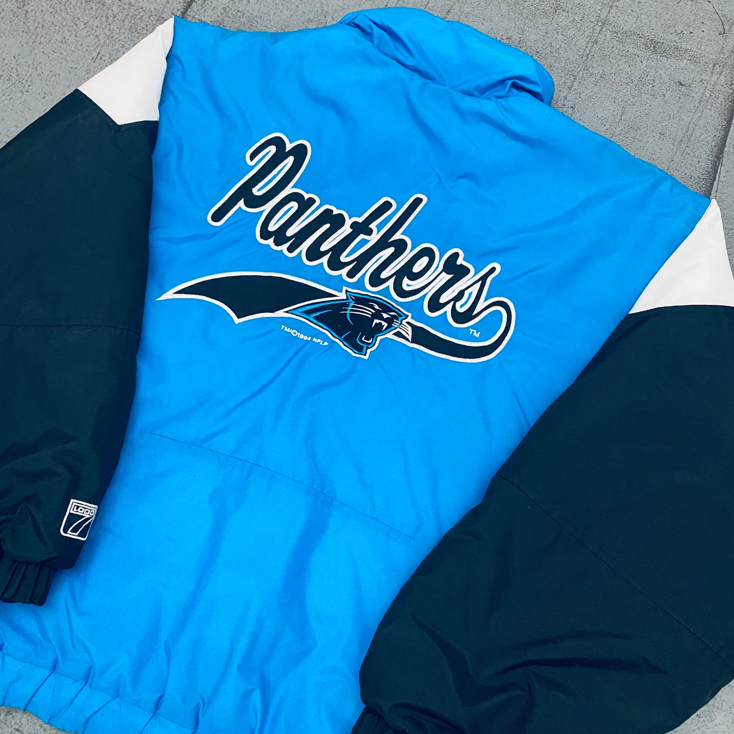 Carolina Panthers: 1994 Logo 7 Team Announce 1/4 Zip Breakaway Jacket (M)