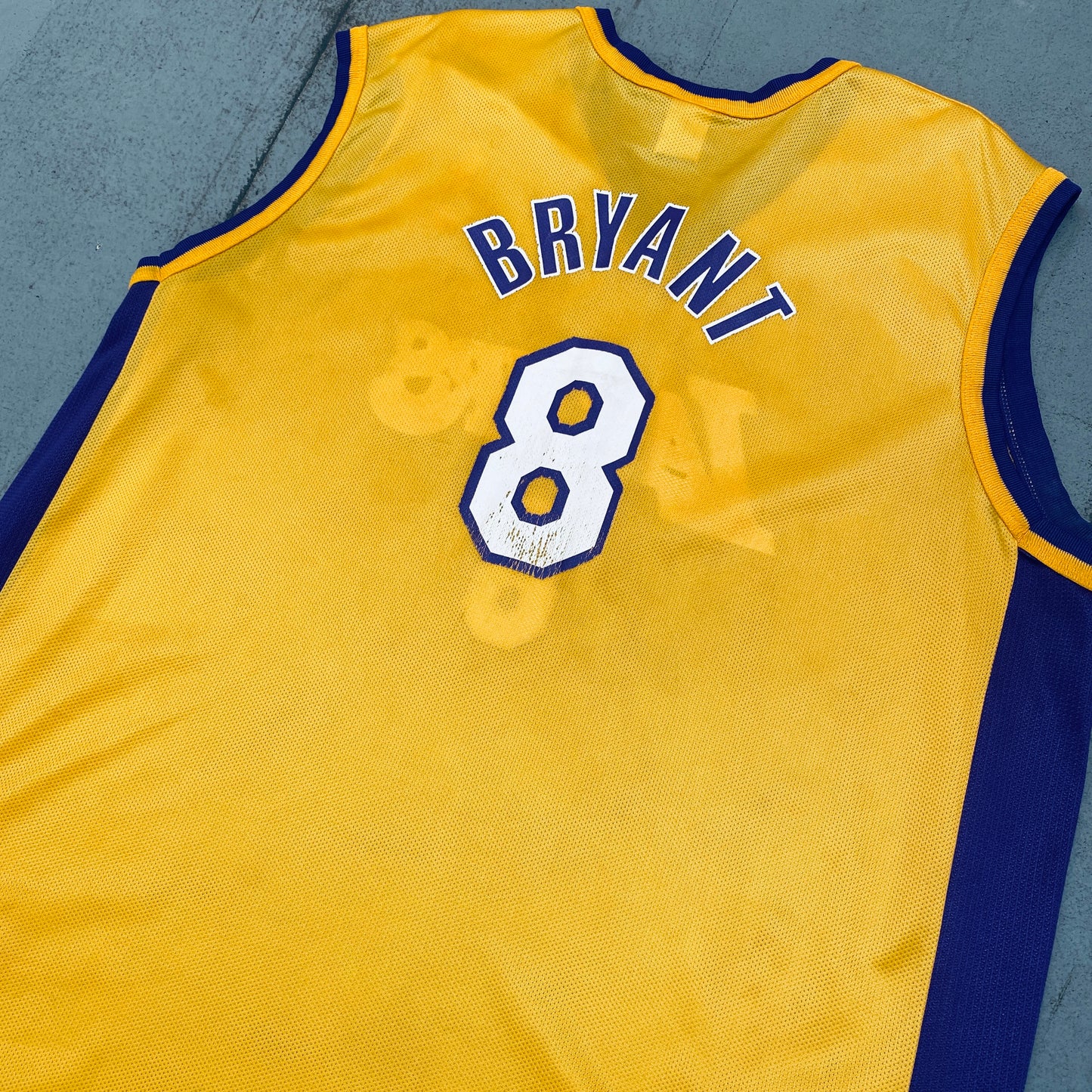 Los Angeles Lakers: Kobe Bryant 1998/99 Yellow Champion Jersey (XL)