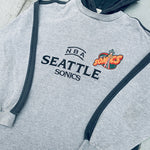 Seattle Supersonics: 1990's Nutmeg Mills Embroidered Spellout Hoodie (M)