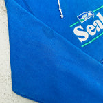 Seattle Seahawks: 1980's Embroidered Spellout Starter Hoodie (L)
