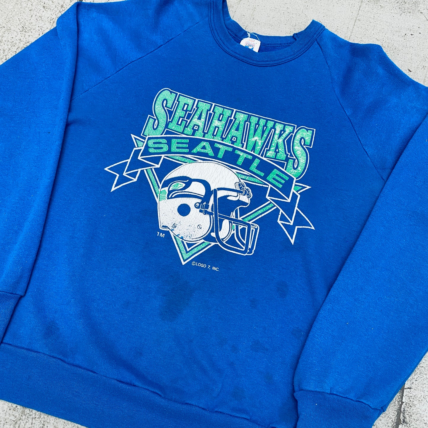 Seattle Seahawks: 1990's Logo 7 Graphic Spellout Sweat (S)