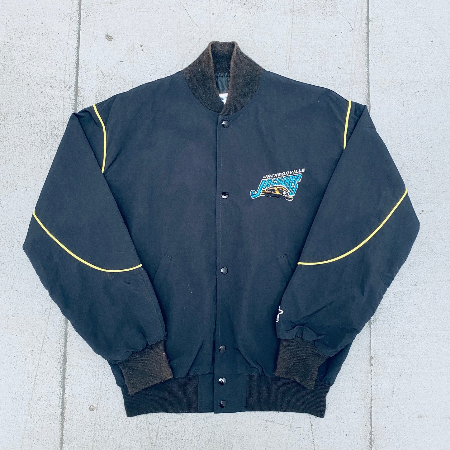 Jacksonville Jaguars: 1993 Blackout Team Announce Starter Bomber Jacket (M/L)