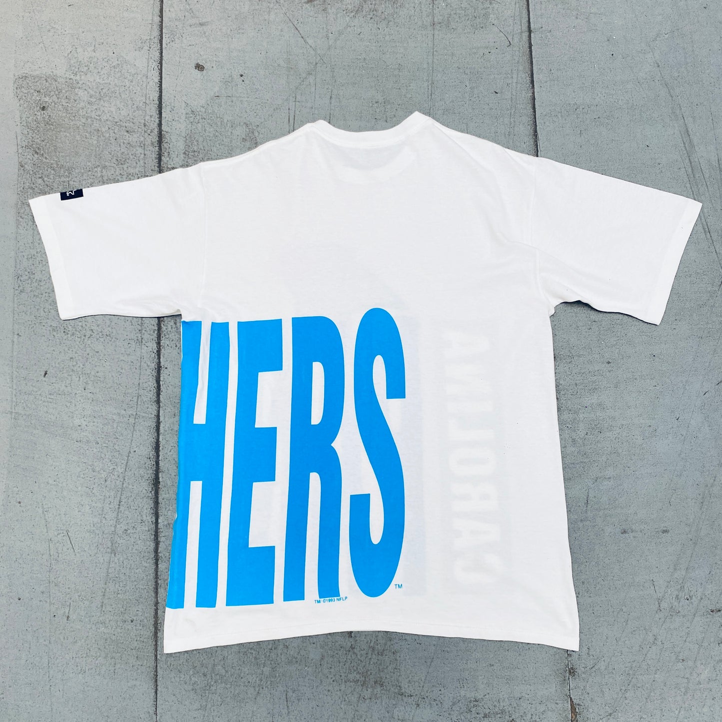 Carolina Panthers: 1993 Team Announce All Over Spellout Starter Tee (L)