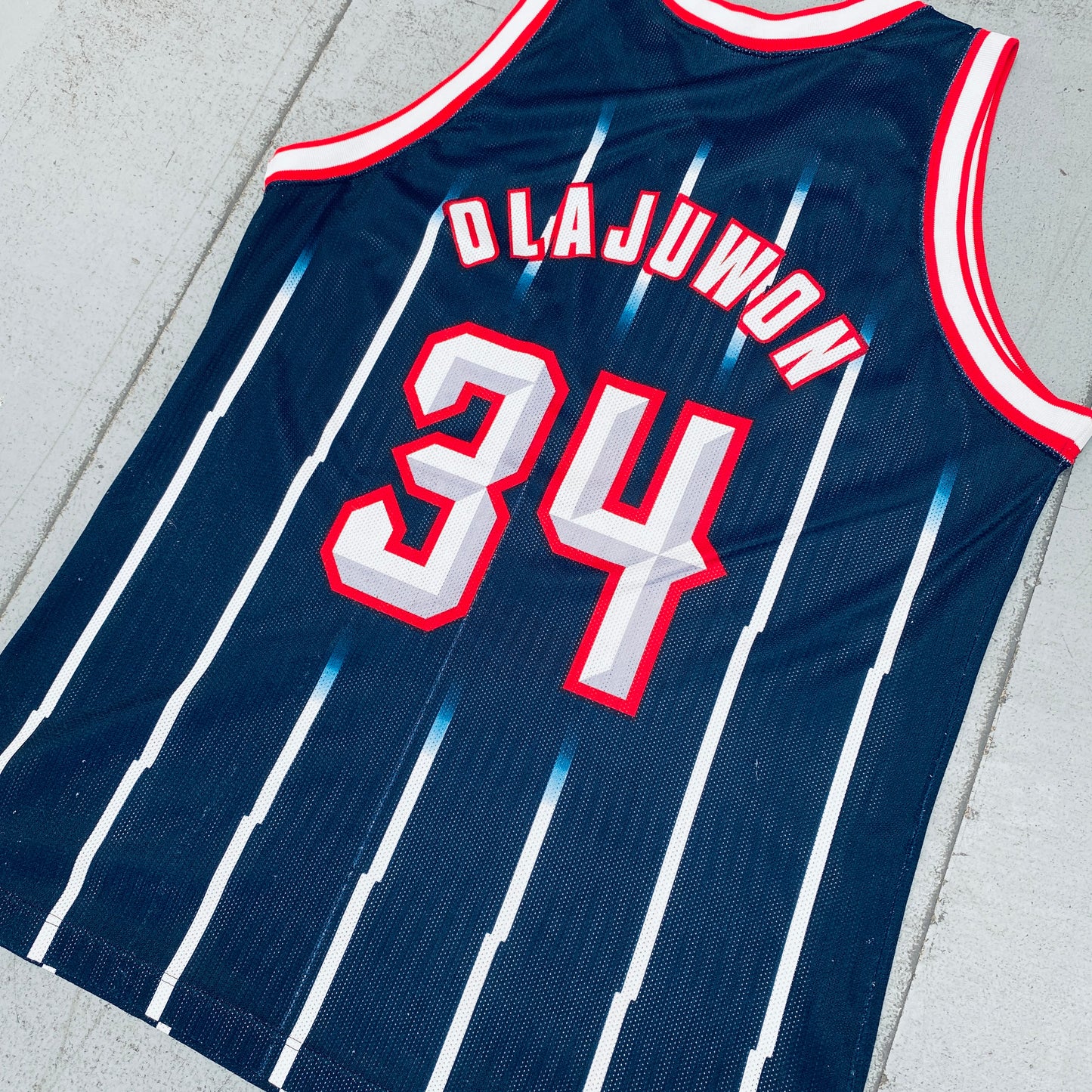 Houston Rockets: Hakeem Olajuwon 1995/96 Navy Champion Jersey (L/XL)