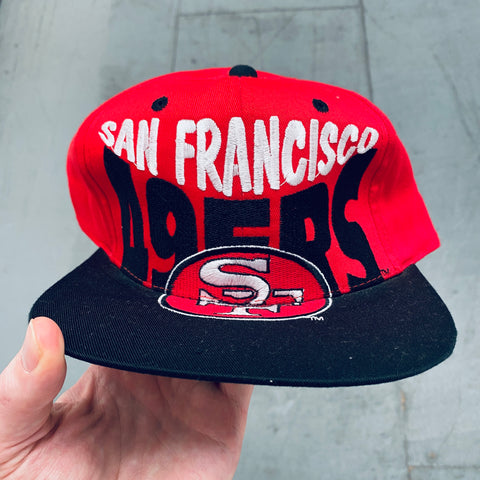 San Francisco 49ers: 1990's Logo 7 Embroidered Spellout Snapback
