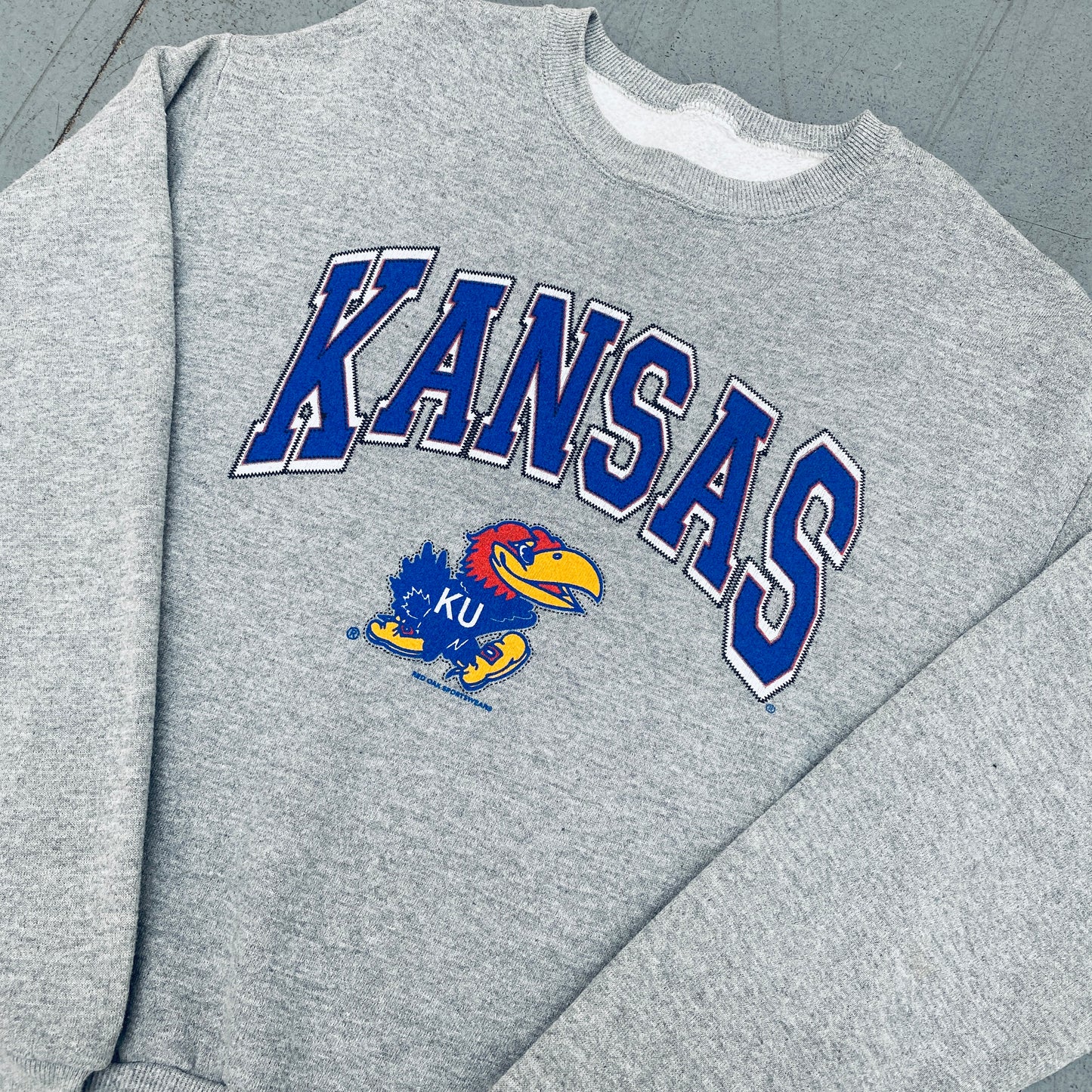 Kansas Jayhawks: 1990's Graphic Spellout Sweat (S)